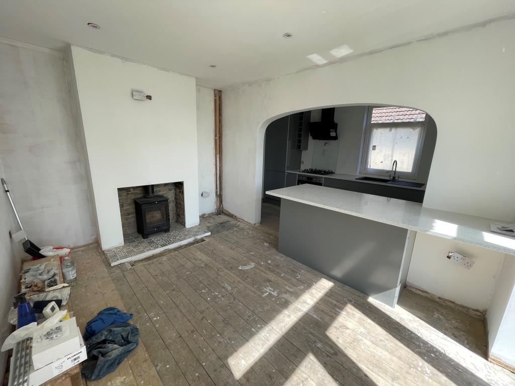Lot: 52 - HOUSE WITH REFURBISHMENT WORKS ALMOST COMPLETE - Dining room with log burner